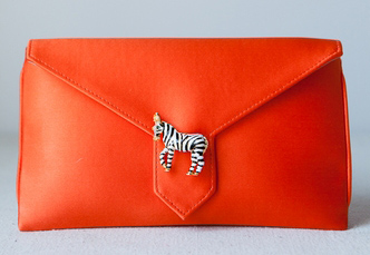 Red purse with zebra accent