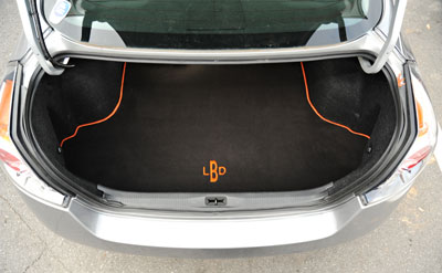 Monogrammed, custom-fit trunk mat by GG Bailey