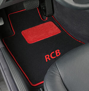 red, black floor mats