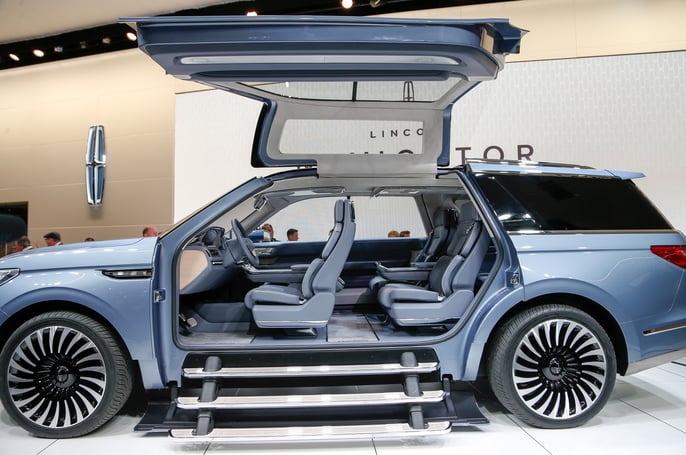 Lincoln-Navigator-concept-on-show-floor-gullwing-doors-open.jpg